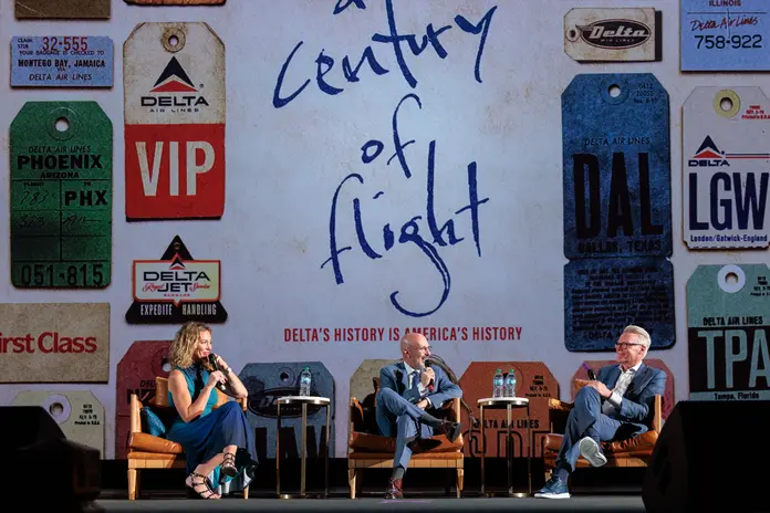 Journalist Brooke Baldwin, director & producer Joshua Seftel and Delta CEO Ed Bastian on stage discussing the film. 