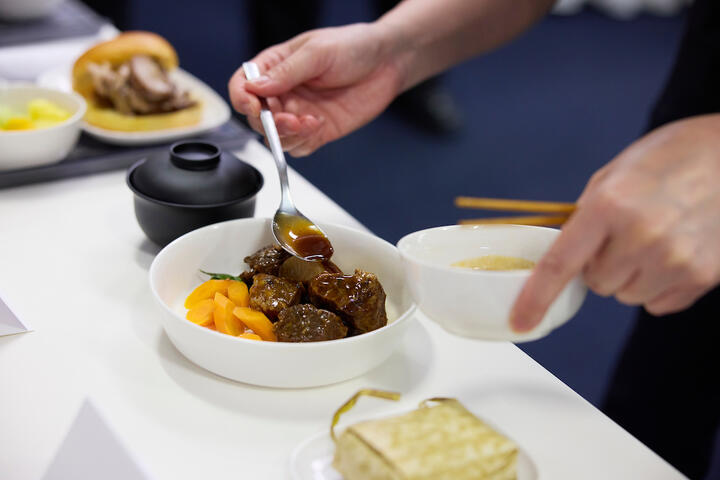 Chef Jereme Leung prepares Asian classics for Delta One service