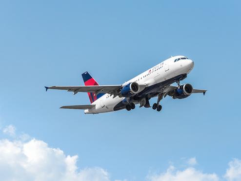 Delta Airbus 319-100 in flight