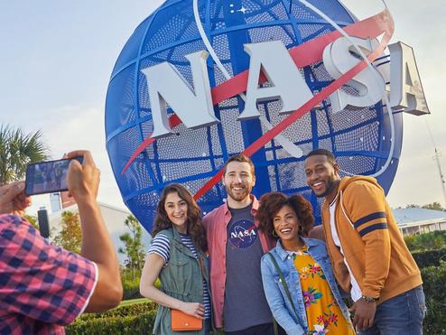 Tourists take a photo at the Kennedy Space Center in Orlando, Florida