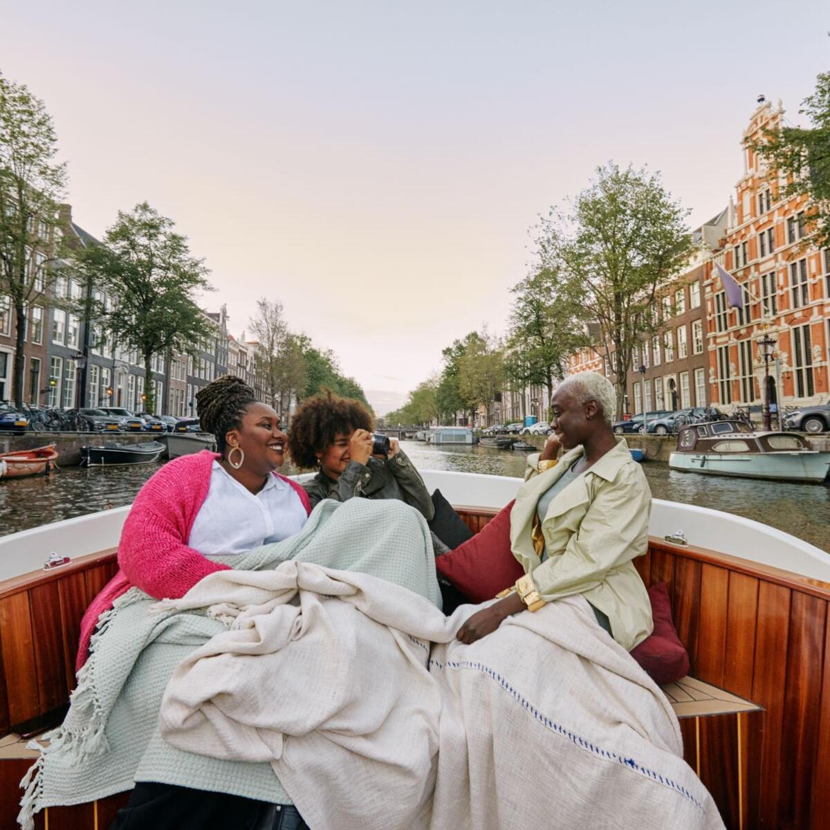 Several people are pictured in one of the images available as part of Delta's joint "Faces of Travel" campaign and database.