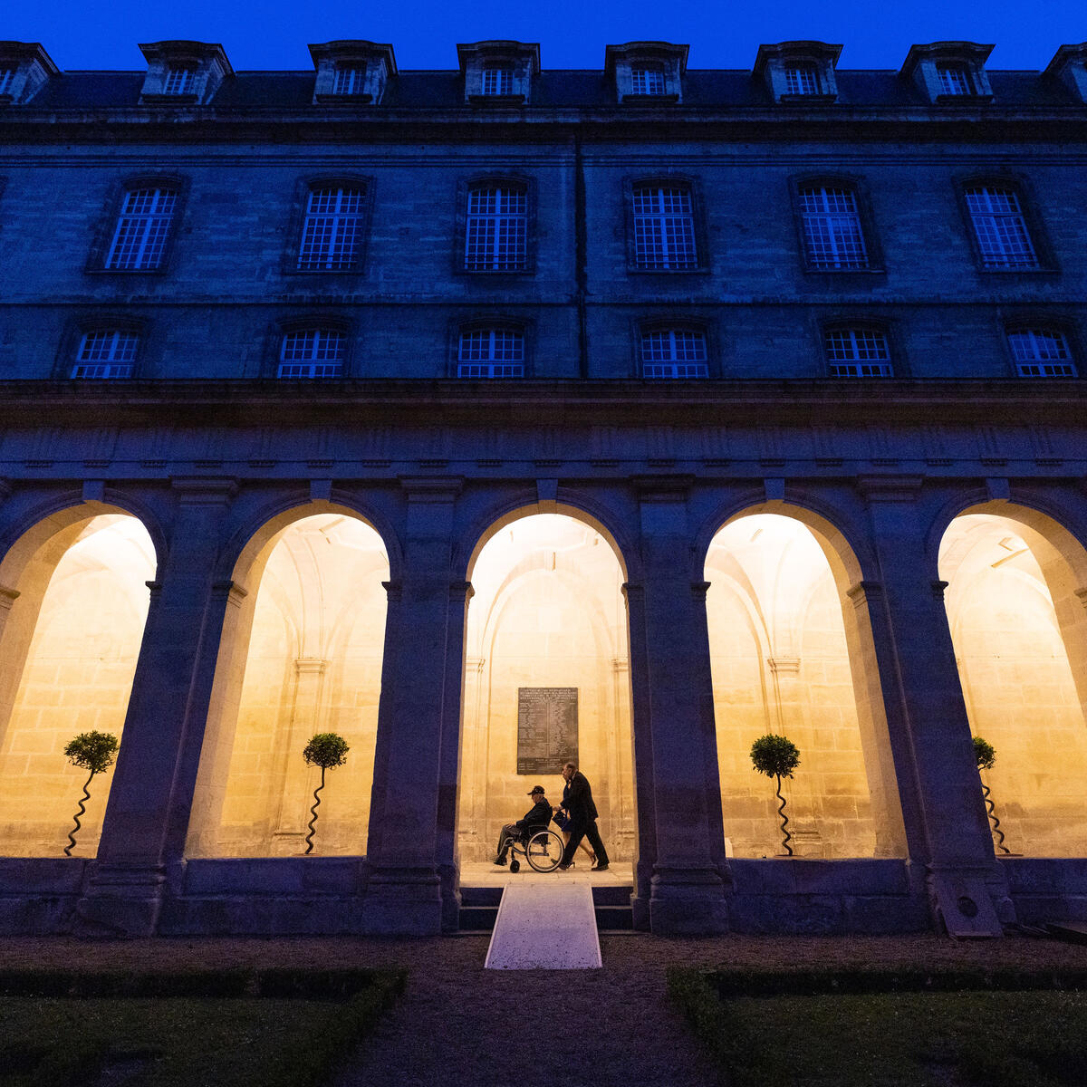 At Abbaye aux Hommes, a former Benedictine monastery in Caen founded in 1063 by William the Conqueror, veterans celebrated the near completion of the program with a farewell dinner hosted by Mayor Joël Bruneau.