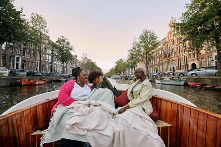 Several people are pictured in one of the images available as part of Delta's joint "Faces of Travel" campaign and database.