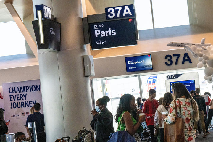 Delta people, customers and friends celebrate the departure of Delta Flight 290 from Los Angeles International Airport (LAX) to Paris Charles de Gaulle Airport (CDG).