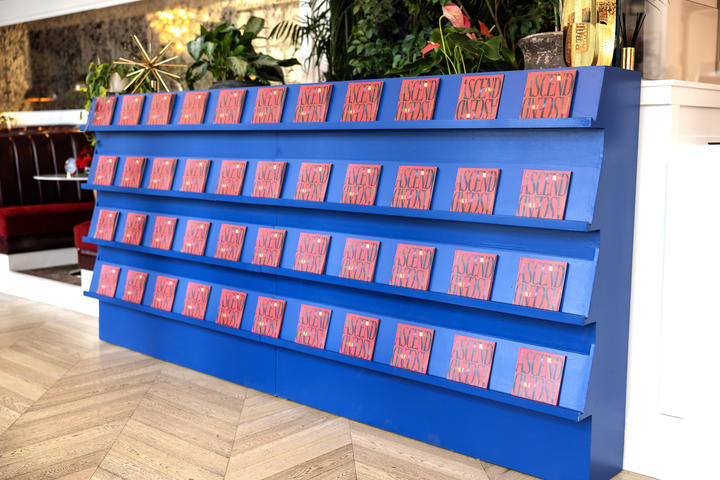 Within the Delta Lounge, a newsstand displays copies of Delta's Ascend zine, a curated guide to SXSW 2024.&nbsp;