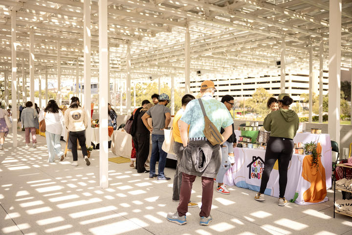 Visitors buzz through the Waterloo Community Market&nbsp;pop-up market featuring more than 20 local artists and entrepreneurs on Sunday, March 10, at Meredith Heritage Tree Deck in Waterloo Park. Delta partnered with&nbsp;Waterloo Greenway and Future Front Texas to host the event.