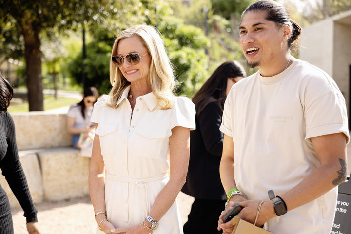 Delta Air Lines CMO Alicia Tillman and Ruben Esquivel, local Austin-based muralist (East End Eclectic) view&nbsp;the Waterloo Greenway activation during the SXSW 2024 festivities.