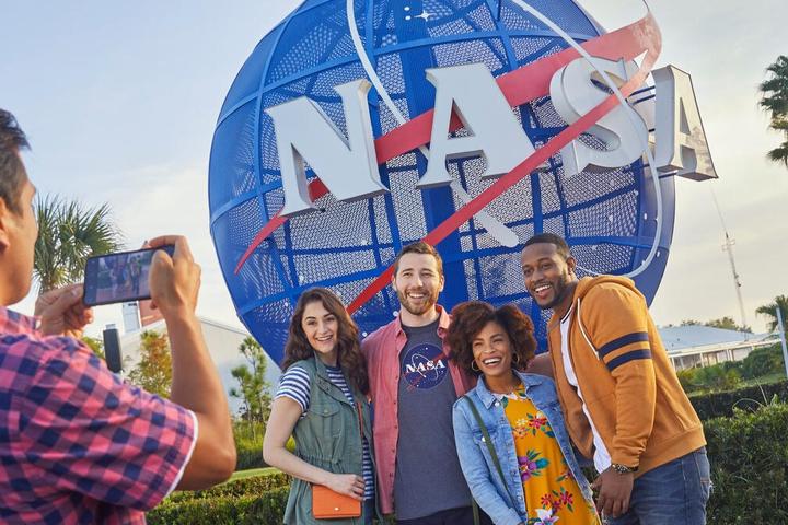 Tourists take a photo at the Kennedy Space Center in Orlando, Florida