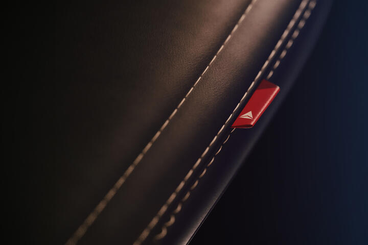 A close-up detail shot of the dress cover for Delta's cabin interior redesign