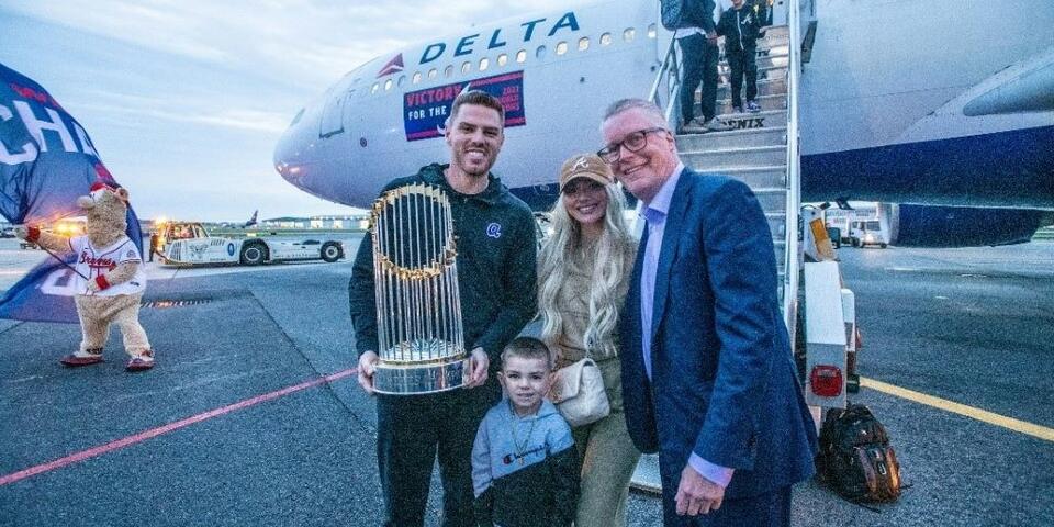Ed poses with Freddie Freeman and his family.