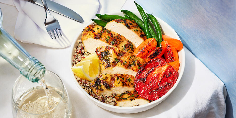 Hearty, simply prepared roasted chicken comes with quinoa, green beans, roasted carrots and Roma tomato.