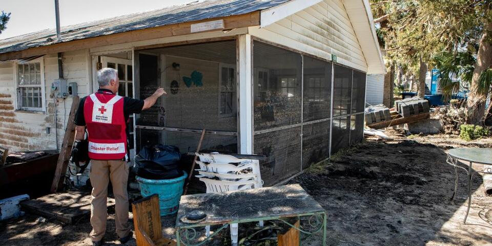 An American Red Cross volunteer aids the needs of others in the wake of Hurricane Helene.