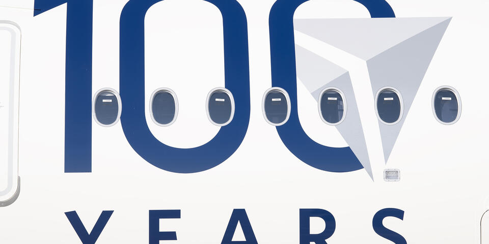 Delta's Centennial livery features a bold 100 emblem.