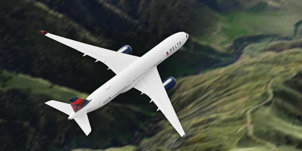 A Delta aircraft is pictured in flight.