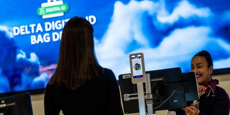 A customer uses Delta's Digital ID feature at the airport.