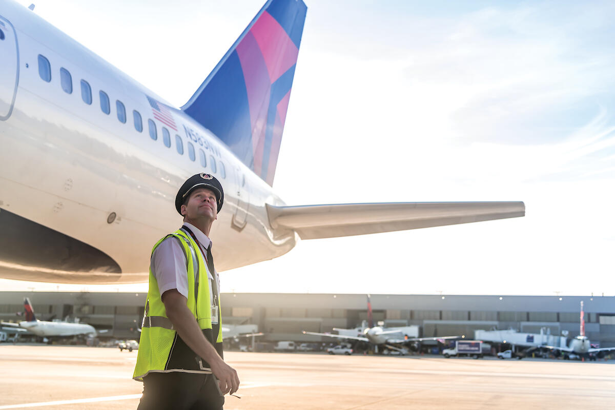 A pilot inspects a 757