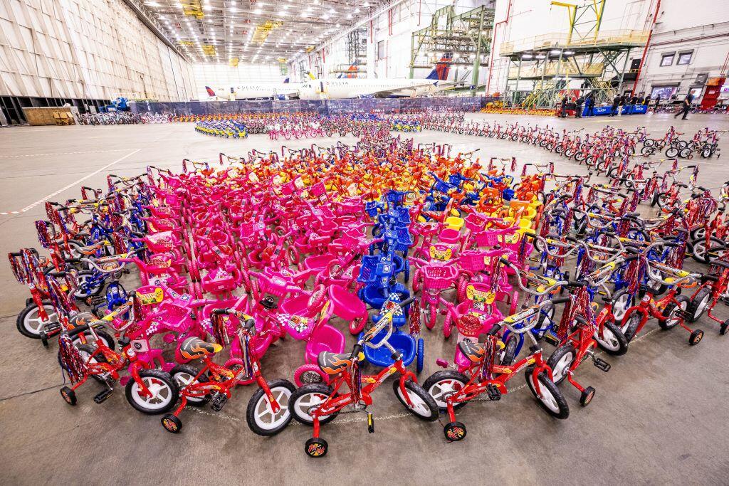 Delta people from TechOps, In-Flight Service, Global Sales, Finance, IT and Flight Operations rallied to purchase and assemble bicycles, as well as rally toy and money donations to support Toys for Tots.