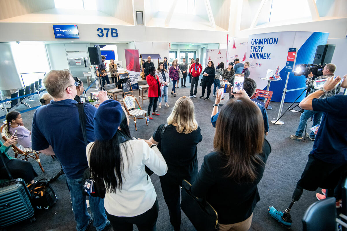 Delta people, customers and friends celebrate the departure of Delta Flight 290 from Los Angeles International Airport (LAX) to Paris Charles de Gaulle Airport (CDG).
