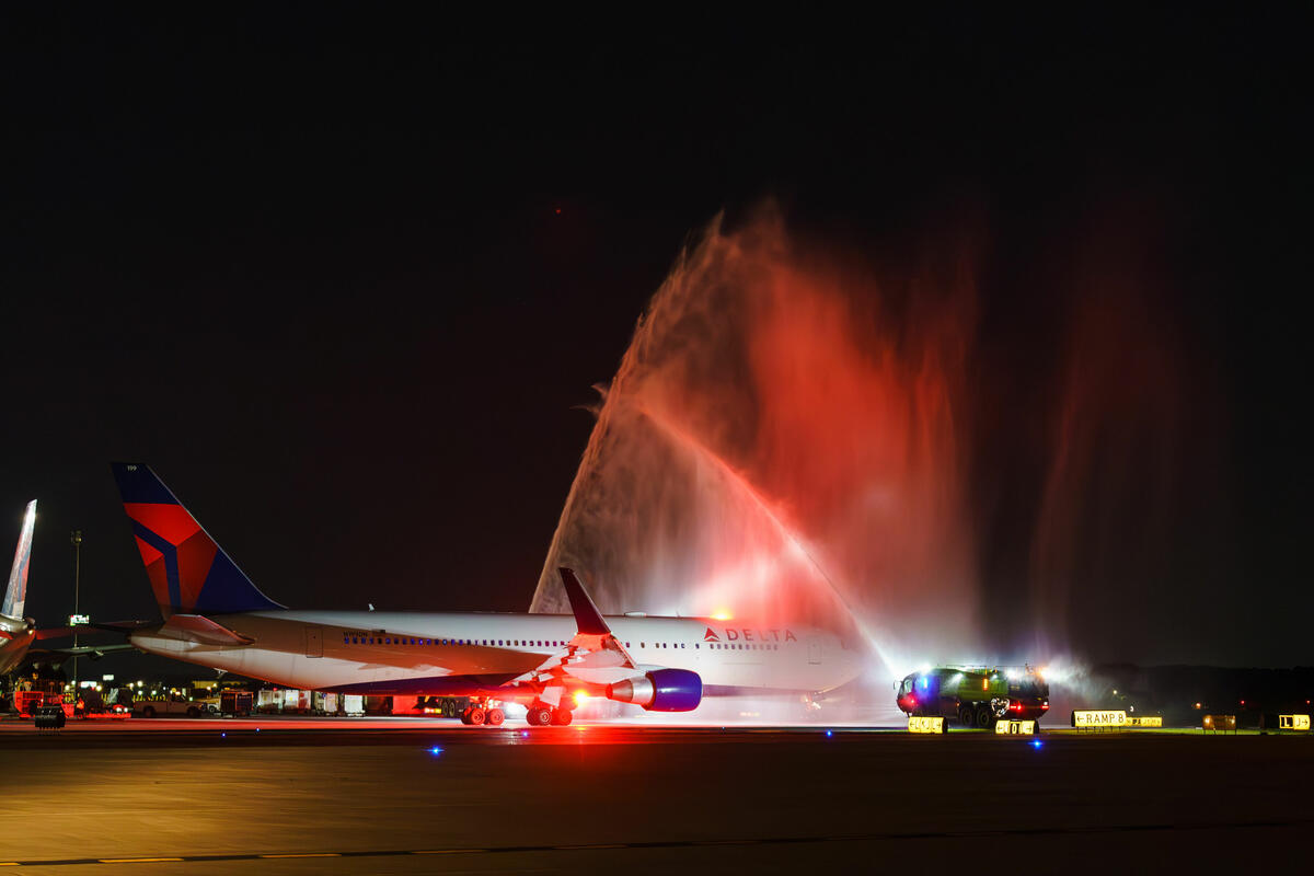 A water cannon salute honors World War II veterans on their journey to Normandy to commemorate the 79th anniversary of the D-Day invasion.
